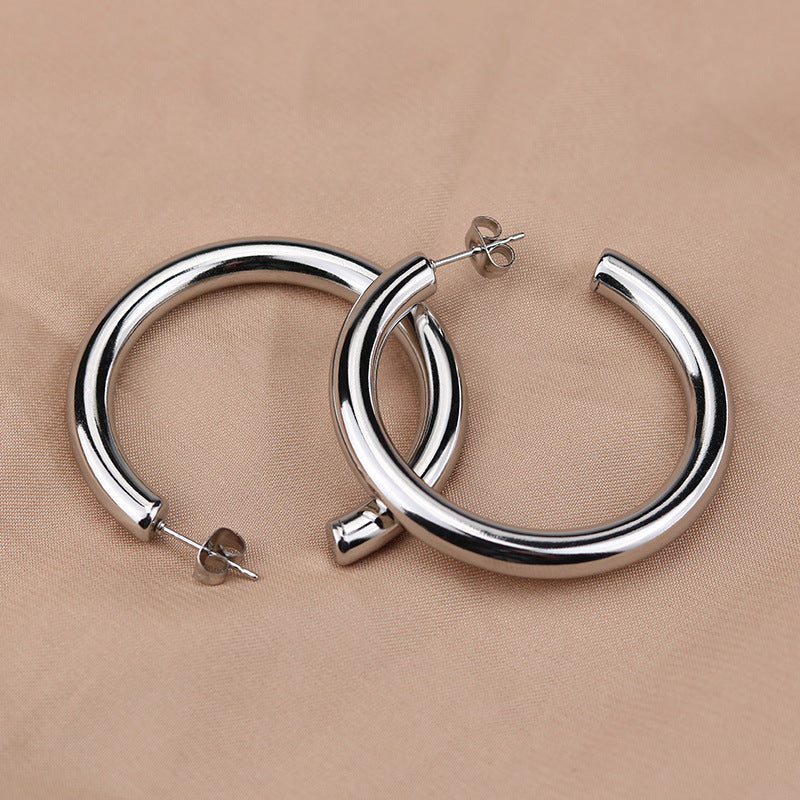 New Fashion Simple Earrings Round Hollow Wire Earrings Titanium Steel Ear Buckle Thick Earrings Ear Jewelry Female Explosive Style